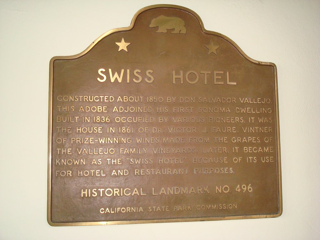 swisshotelhistoricallandmarksigndoesntreallyexplainwhyswisswouldbeattachedtoaplaceusedforhotelandrestaurantpurposes.jpg
